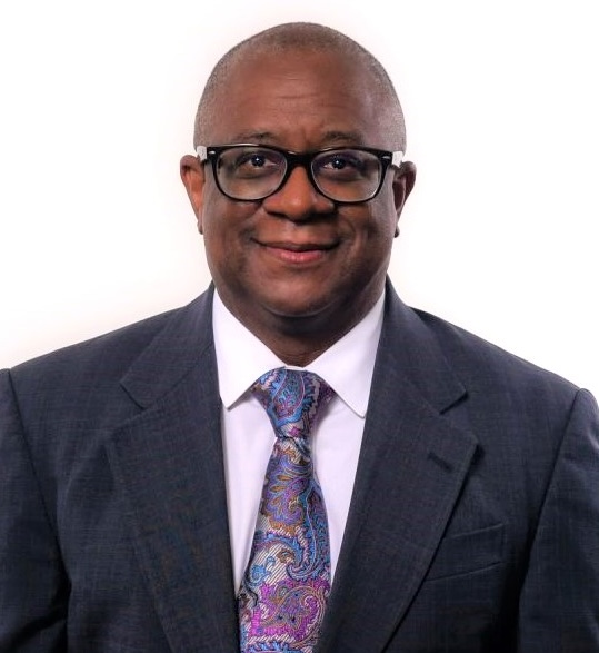man with glasses wearing a suit